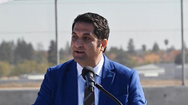 Fresno City Councilperson Mike Karbassi representing District 2 speaks at the ribbon-cutting ceremony for the opening of Veterans Boulevard Monday, Nov. 20, 2023 in Fresno.